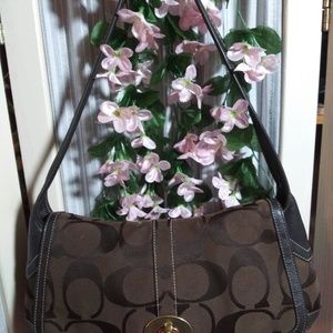 Coach signature C Jacguard/Leather trim ergo flap